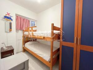 Postel nebo postele na pokoji v ubytování Plata baja en zona de Vilafortuny 102C - INMO22