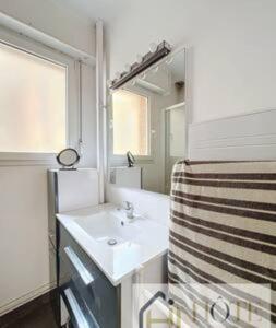 Et badeværelse på Digue de Mer - Appt Vue Mer 3CH Balcon, Bray-Dunes