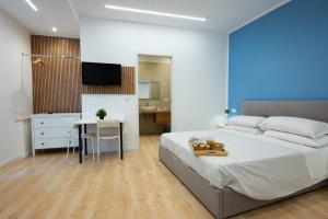 TV a/nebo společenská místnost v ubytování B&B del Sole