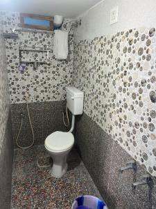 Koupelna v ubytování PANMOZHI RESIDENCY