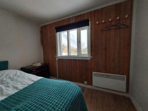 Ένα ή περισσότερα κρεβάτια σε δωμάτιο στο Guesthouse Nýp