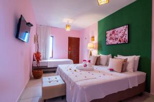 Pousada Solarium de Gostoso客房内的一张或多张床位