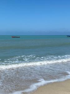 a view of the ocean from the beach at Casa Murillo in San Antero