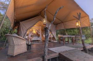 Een restaurant of ander eetgelegenheid bij Mara Major Camp