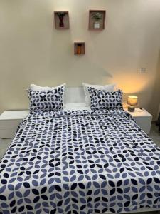 Voodi või voodid majutusasutuse Sall Residence Mbour, Appartement 3 toas