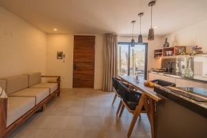 Kuchyň nebo kuchyňský kout v ubytování Punta Agave Suites
