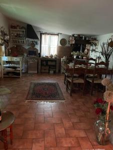 Posezení v ubytování La casina di Simo + 1 fotografie