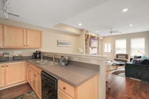 a kitchen with a sink and a counter top at Lux Townhouse, Walk to All, Sleeps 6 Adults in Louisville