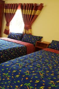 Ένα ή περισσότερα κρεβάτια σε δωμάτιο στο Mifa Homestay