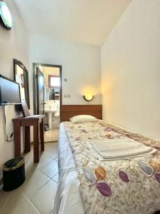 Postel nebo postele na pokoji v ubytování Hotel Grbalj