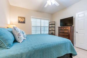 En eller flere senge i et værelse på Orange Beach Villas - Allure + 29 billeder