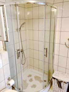 a shower with a glass door in a bathroom at Levanda in Trogir +21 photos
