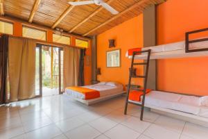 Postel nebo postele na pokoji v ubytování Punta Pacífico Bungalows Máncora + 37 fotografií