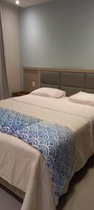 Postel nebo postele na pokoji v ubytování Aqualand Resort Salinas