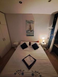 מיטה או מיטות בחדר ב-Apartment Dado Zadar