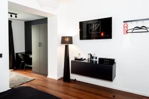 Televisyen dan/atau pusat hiburan di Hotel Deluxe