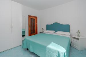 Posteľ alebo postele v izbe v ubytovaní Little House