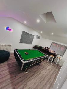 a billiard room with a pool table in a room at HOME Hertford in Hertford