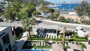 an aerial view of a building with a resort at Bitez Adam Otel in Bodrum City