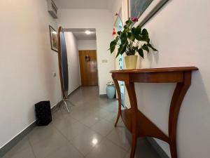 Televízia a/alebo spoločenská miestnosť v ubytovaní Apartment Golden Creek Magic View