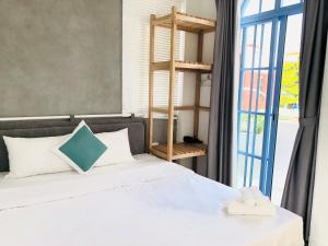 a bedroom with a bed with a ladder and a window at Serena Villa, Da Nang, Viet Nam, 3 bedrooms - Vietnam in Danang +27 photos