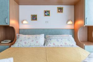 Postel nebo postele na pokoji v ubytování Hotel Atlantic