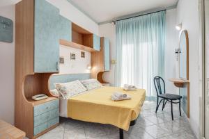 Postel nebo postele na pokoji v ubytování Hotel Atlantic