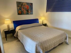 Postel nebo postele na pokoji v ubytování Casa Vacanza Le Case
