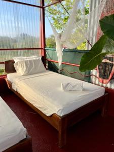 Postel nebo postele na pokoji v ubytování Villas Jacquelina