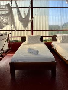Postel nebo postele na pokoji v ubytování Villas Jacquelina