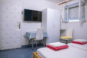 Postel nebo postele na pokoji v ubytování Studios Lavender