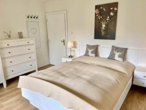 Posteľ alebo postele v izbe v ubytovaní Gastuna Suites