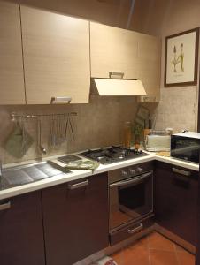 Η κουζίνα ή μικρή κουζίνα στο Casa Vacanze Rustico Di Corte