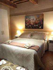 Ένα ή περισσότερα κρεβάτια σε δωμάτιο στο Casa Vacanze Rustico Di Corte