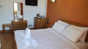 Letto o letti in una camera di Adriatica Hotel Marsa Matrouh