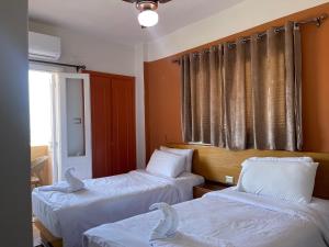 Letto o letti in una camera di Adriatica Hotel Marsa Matrouh
