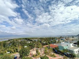 an overhead view of a town with palm trees at Khách sạn Trung Dung in Phù Cát