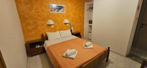 Ліжко або ліжка в номері Hotel Palladion
