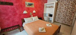Ліжко або ліжка в номері Hotel Palladion