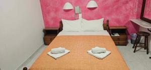 Ліжко або ліжка в номері Hotel Palladion