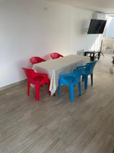 TV a/nebo společenská místnost v ubytování Casa de Playa con piscina