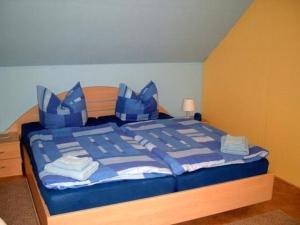 Кровать или кровати в номере Wohnung in Hauptmannsgrün