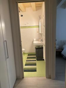 a bathroom with a sink and a toilet at SanPietro in Verona