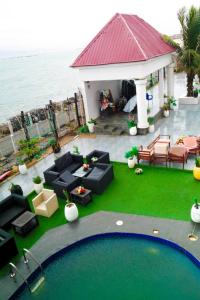an aerial view of a house with a pool at Blue Moon Beach Hotel and Resort Lekki Lagos in Lagos