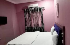 Krevet ili kreveti u jedinici u okviru objekta FIBIS HOTEL