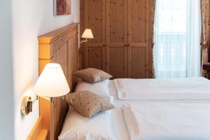 Postel nebo postele na pokoji v ubytování Hotel Goldene Rose
