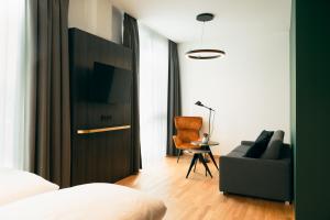 TV a/nebo společenská místnost v ubytování TARGET WORLD Hunter's Lodge