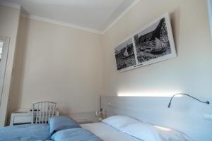 Postel nebo postele na pokoji v ubytování Albergo Cristina