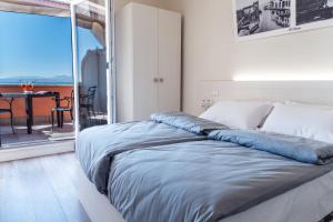 Postel nebo postele na pokoji v ubytování Albergo Cristina