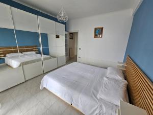 Postel nebo postele na pokoji v ubytování Casa delle Calle